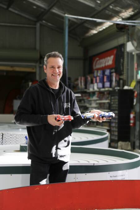 FAMILY FUN: Michael Dixon with some slot cars at Show Us Ya Slotz in Lemon Tree Passage. Picture: Ellie-Marie Watts