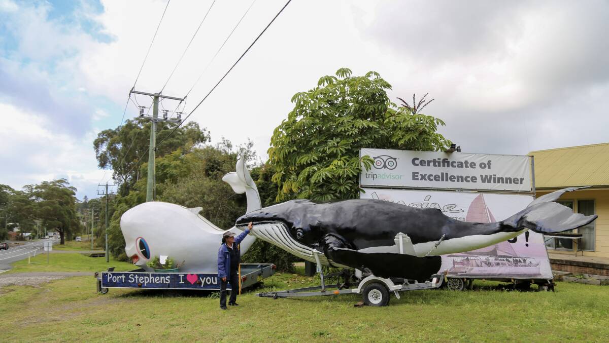 Frank Future with Miggy and the fibreglass humpback whale that's in need of a name in Nelson Bay. Pictures: Ellie-Marie Watts