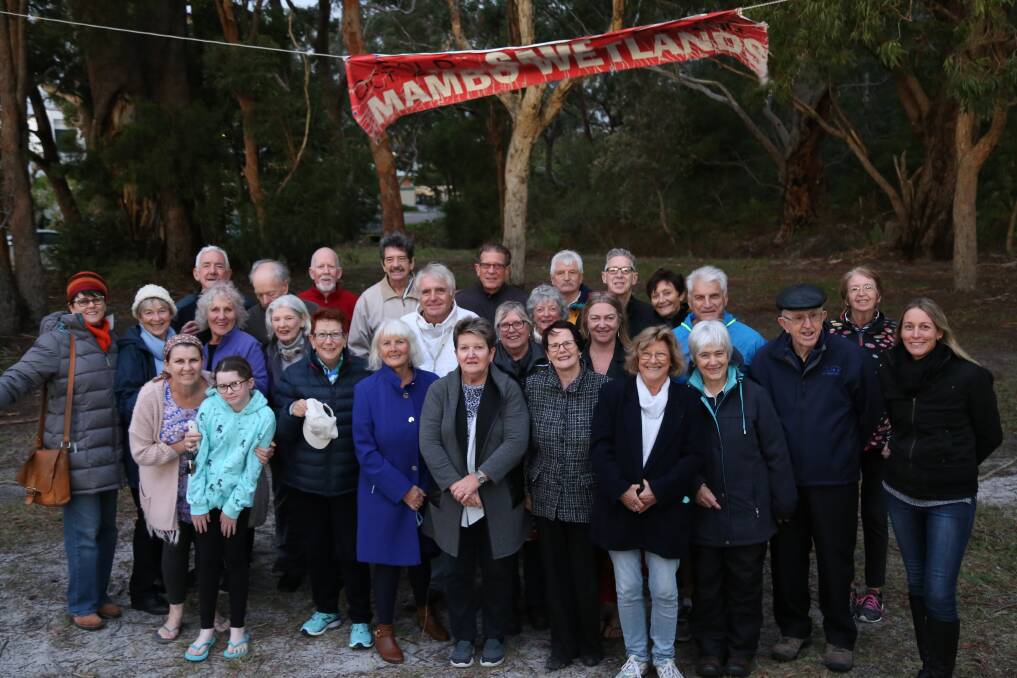 Port Stephens residents, including members of the Mambo-Wanda Wetlands Conservation Group, at the site on Monday following news of the buy-back.