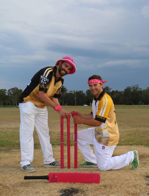 Tom MacKenzie and Bronson Marshall with the Medowie Yowies' Pink Stumps Day gear.
