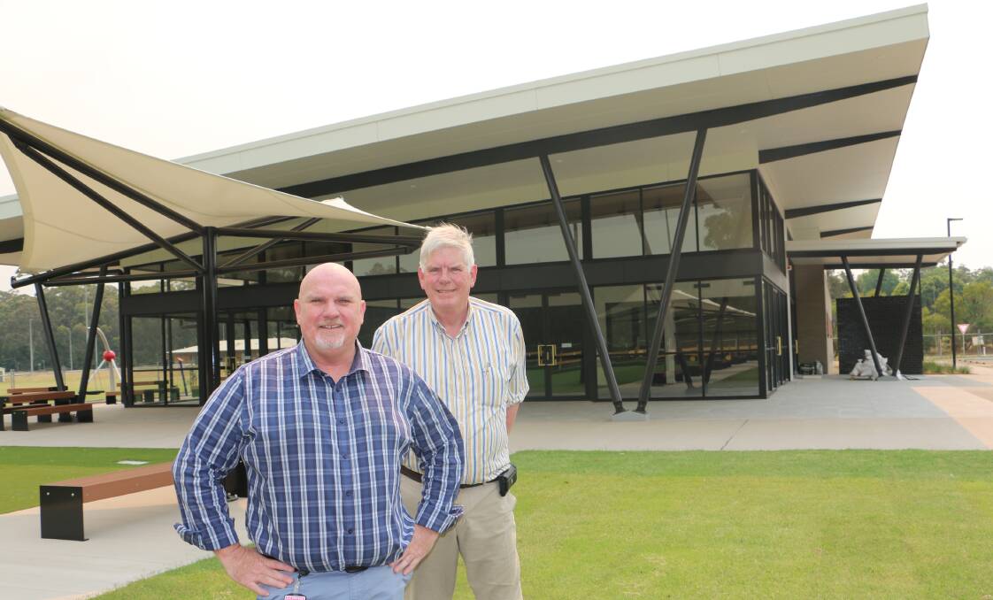 Port Stephens central ward Chris Doohan with Medowie Sports and Community Club president Craig Baumann in front of the $6.5 million facility.
