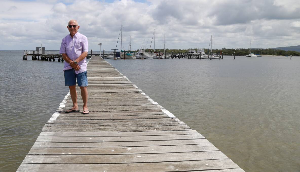 REPAIRS: Moorings Marina Committee member Hugh Mountford standing on the section of Sunset Beach jetty that will be upgraded during the next six weeks.
