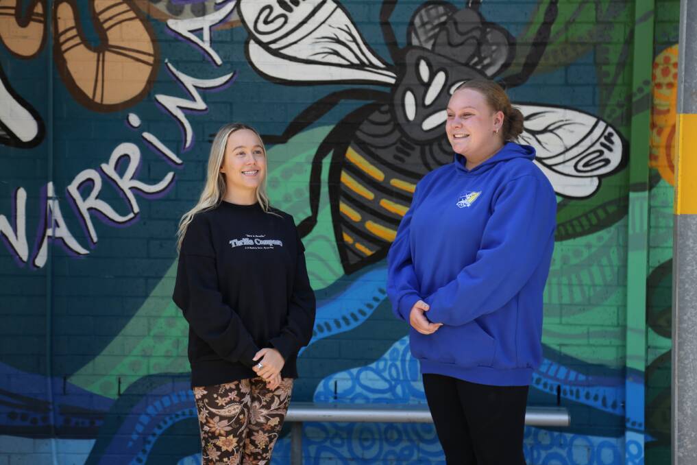 LOOKING FORWARD: Irrawang High School vice captain Ellie Martin and captain Caity Ping, both 18. Picture: Ellie-Marie Watts
