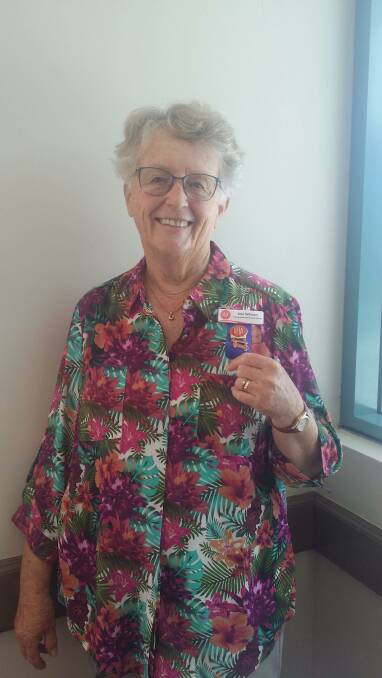 Ann Watson with her 20 years service badge, presented to her at the Tomaree Community Hospital Auxiliary AGM on November 9.