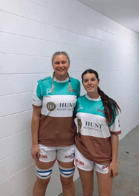 RUGBY UNION: Nelson Bay Gropers sevens players Kate Holland and Emily Freeman debuted for the Hunter Wildfires in Sydney on August 1. Picture: Facebook/Nelson Bay Rugby Club