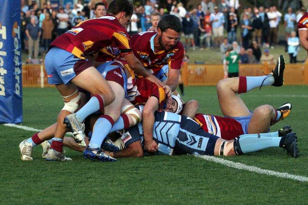 Fingal Bay (red) v Shortland (blue) in the NHRL A-grade grand final played at No. 1 Sportsground Newcastle on Saturday. Picture: Valentine Sports Photography