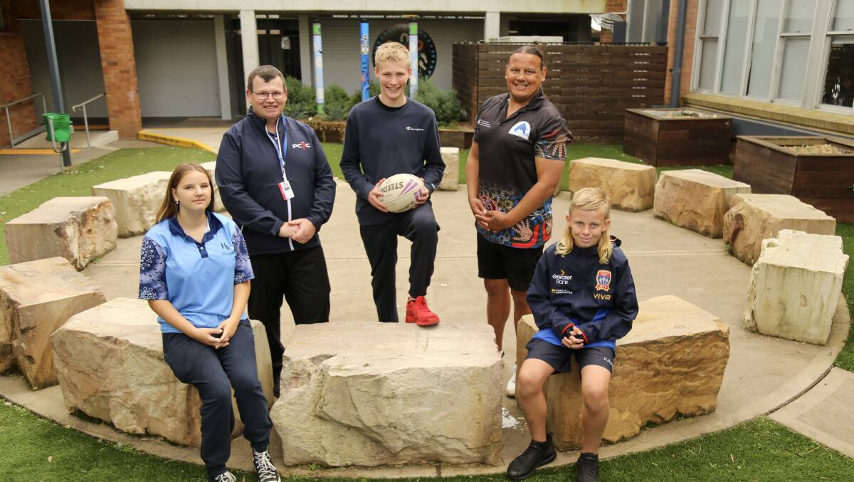 WORIMI PROUD: Hunter River High School students Xanthiah Roach, 15, Brodie Langdon, 15, and Jackson Smith, 14, with PCYC Port Stephens manager Travis Douglass and aboriginal education officer Brooke Roach.