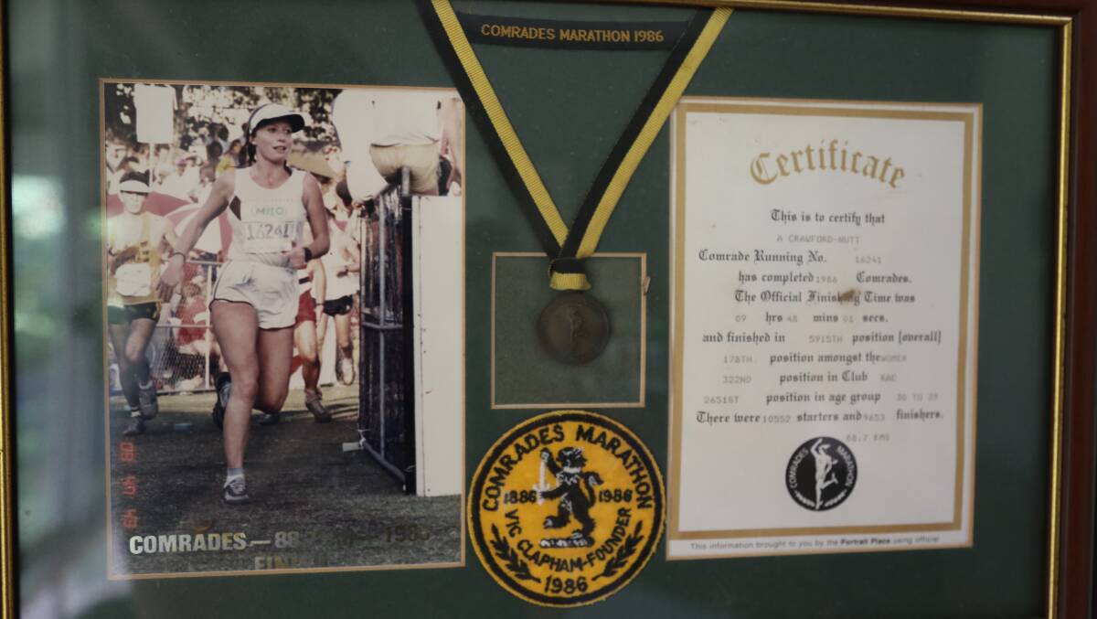 A picture frame in Anne Crawford-Nutte's 'running room' showing her first Comrades Marathon. Picture: Ellie-Marie Watts