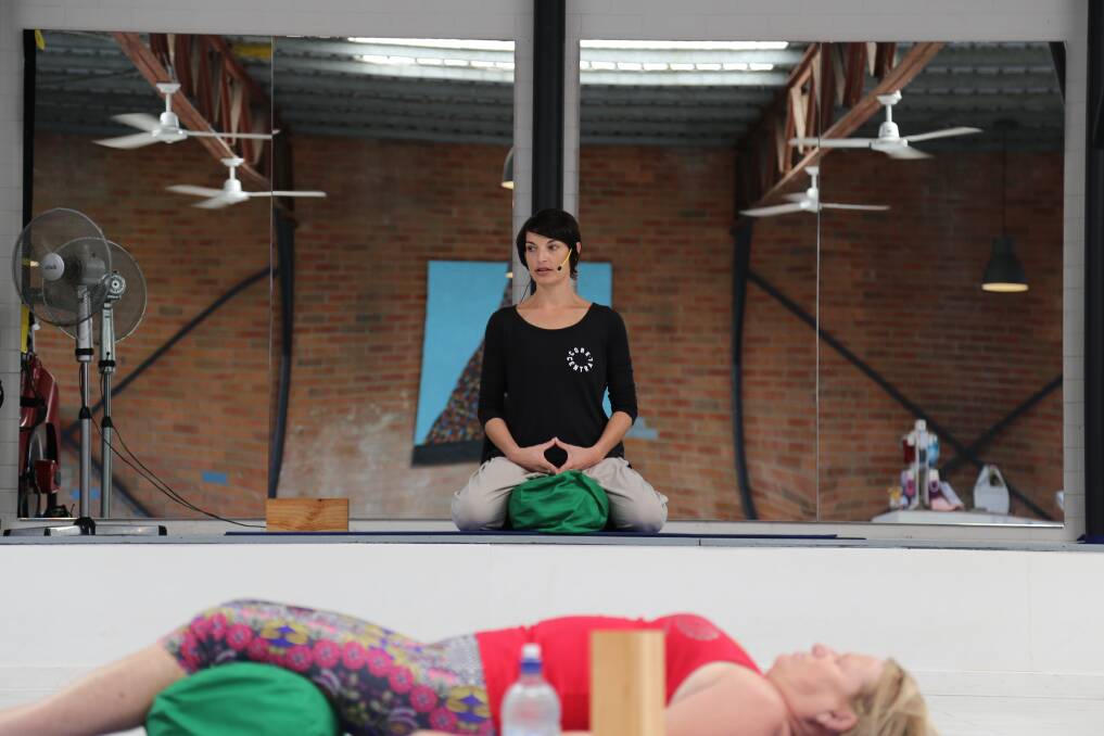 CALMING: Yoga instructor Skye Swan teaching a class at Core Central in Corlette. Picture: Ellie-Marie Watts