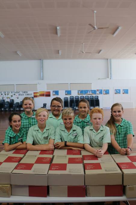 St Michael's Primary School Children boxed up 28 care packages for troops deployed overseas, in time for Anzac Day.