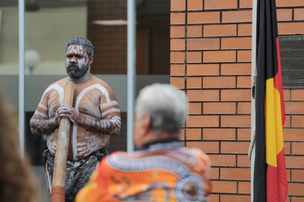 Photo from the COVID-safe 2020 NAIDOC Week flag raising ceremony and re-signing of the Yabang Gumba-Gu agreement at the Port Stephens Council administration building in Raymond Terrace on Monday, November 9. John Schultz with the didgeridoo.