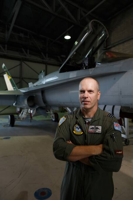 TAKE OFF: Wing Commander Tim Main, commanding officer of 88 Squadron, with a Classic Hornet at the launch of Exercise Diamond Shield. Picture: Max Mason-Hubers