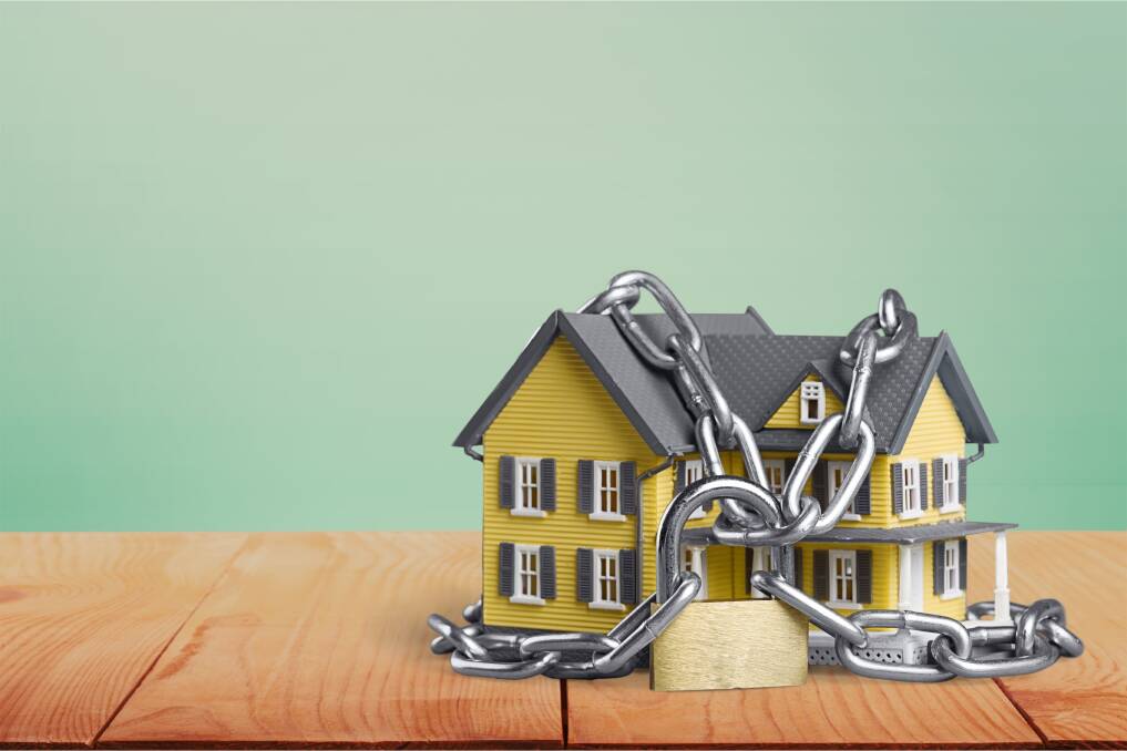 Securing your home: There are many ways to keep your home, valuables and most importantly, family, safe. These include locks, security cameras and professionally monitored alarm systems. Photo: Shutterstock.