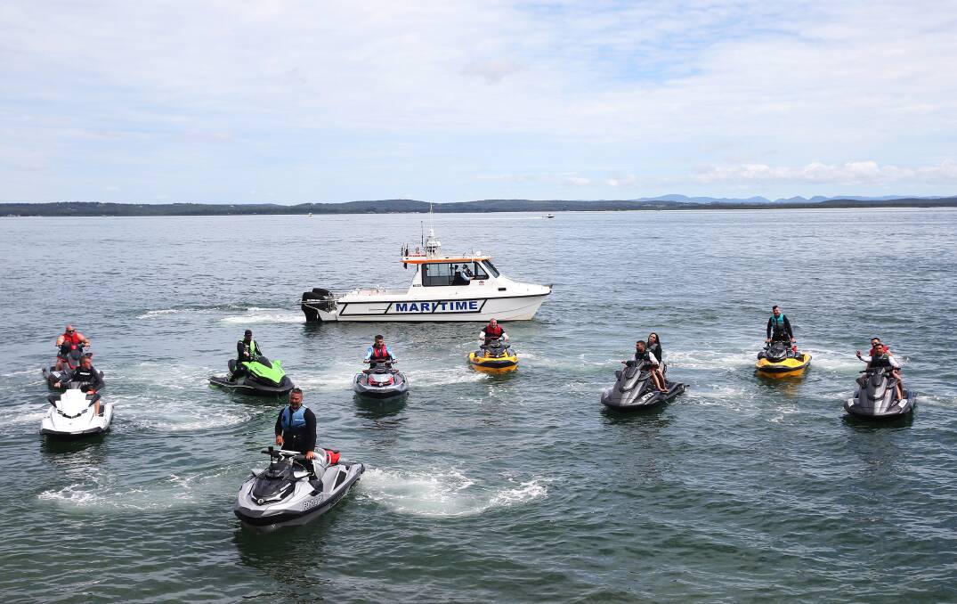 Jet ski riders, with George Fokas at the front, at Nelson Bay. Picture: Peter Lorimer 