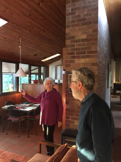 Elisbeth Jackson showing Brian Suters around the New Lambton House he designed for her family. Picture: Scott Bevan