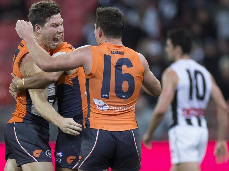 Toby Greene (l) kicked two goals and had 27 possessions in GWS's AFL win over Collingwood.