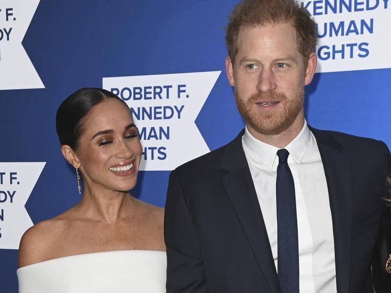 Harry and Meghan signed lucrative deals with Netflix and Spotify after quitting as working royals. (AP PHOTO)