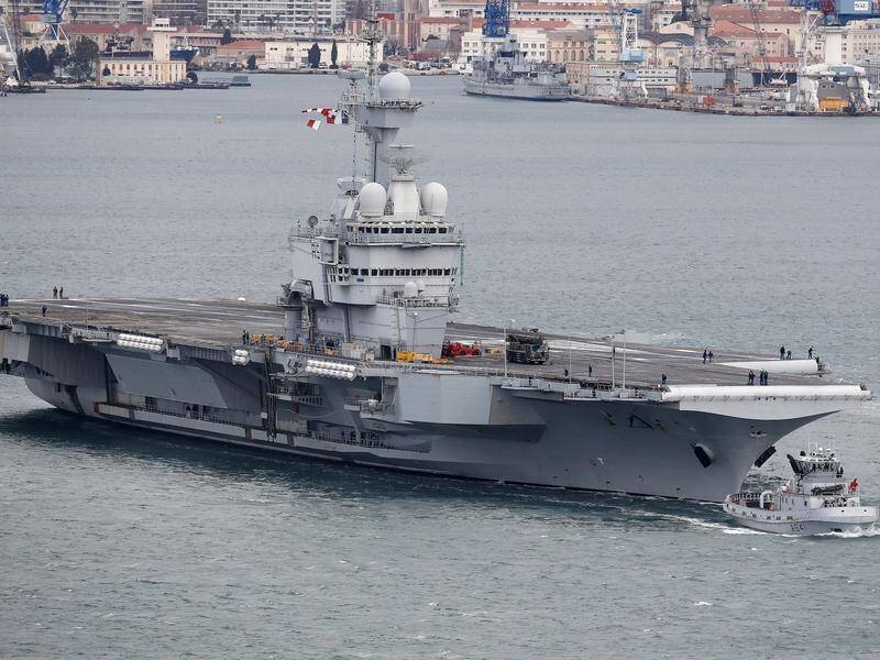 Some crew members on the French aircraft carrier Charles De Gaulle have symptoms of coronavirus.
