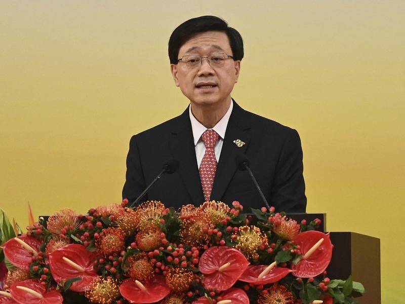 Hong Kong leader John Lee has unveiled a new visa scheme to woo global talent. (AP PHOTO)