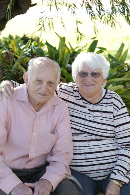 BOWLING ON: Lionel and Margaret Lewis, at their home in Tanilba Bay, have been married for 60 years. Picture: Stephen Wark
