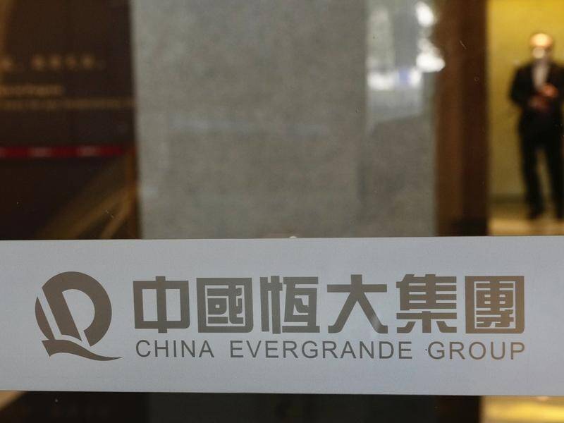 Chinese property developer Evergrande has missed coupon payments on two US dollar bond tranches.