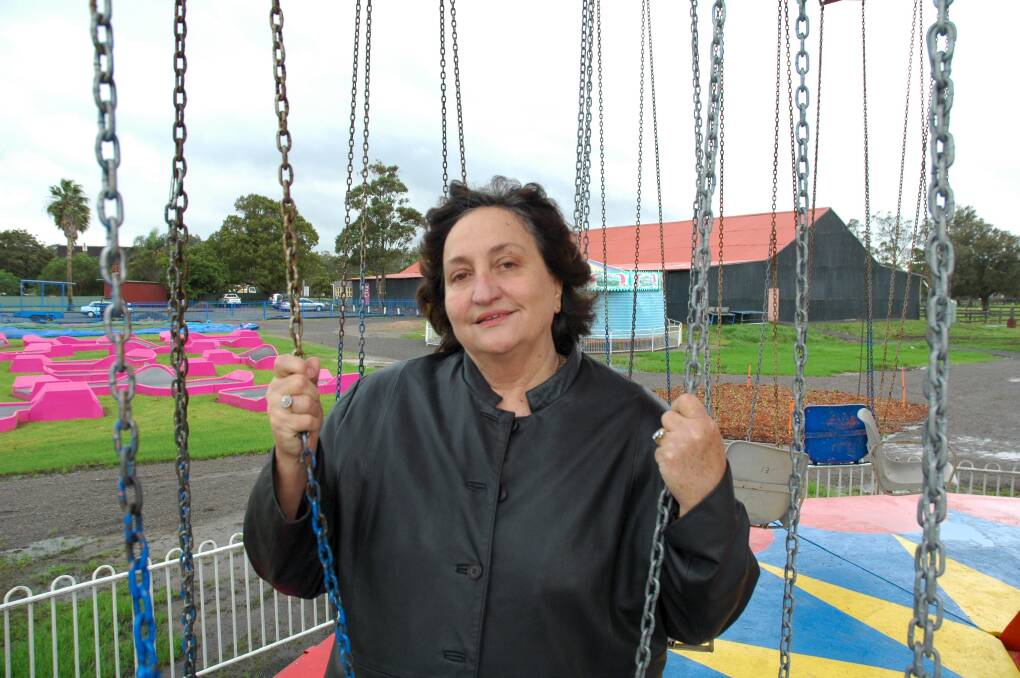BETTER DAYS: Dizzyland co-owner Paula Haas during happier times, at the park in 2008 when it opened.