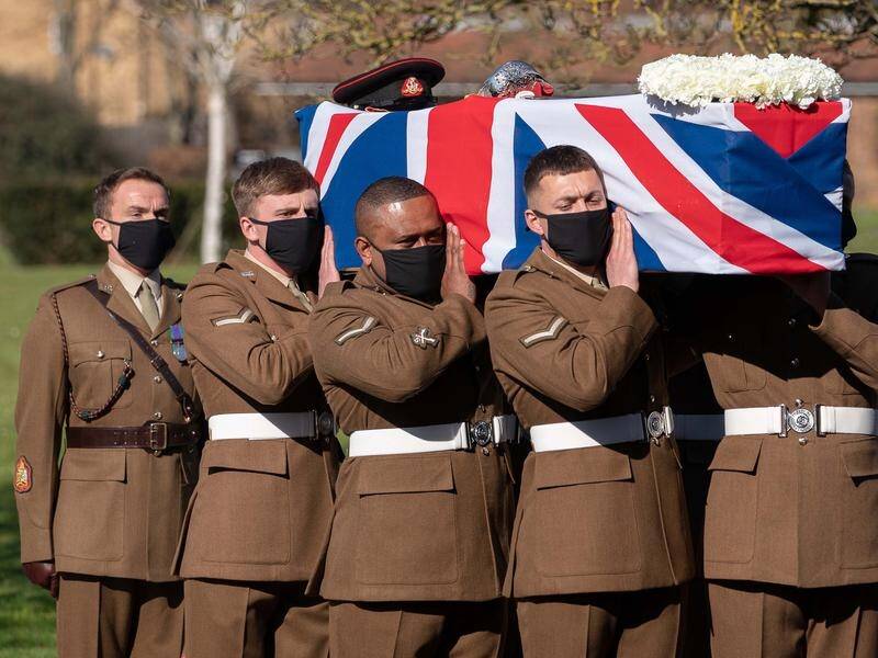 A World War II-era plane has flown over the funeral service of Captain Tom Moore in the UK.