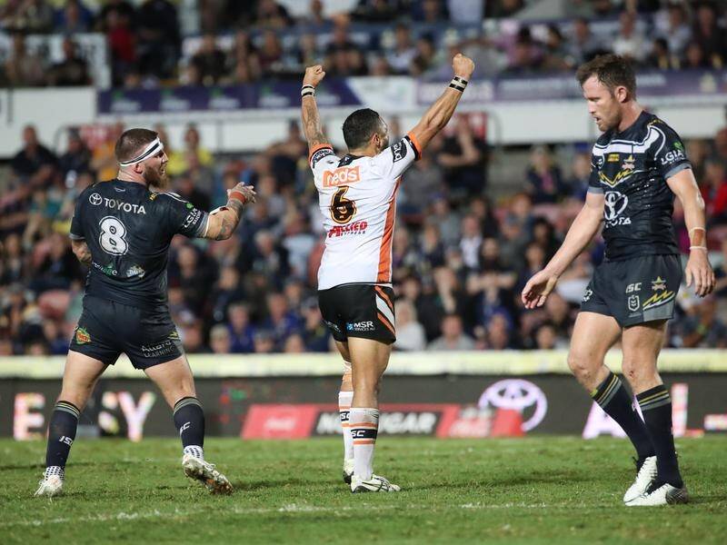 Benji Marshall celebrates booting his golden-point field goal for the Tigers in Townsville.