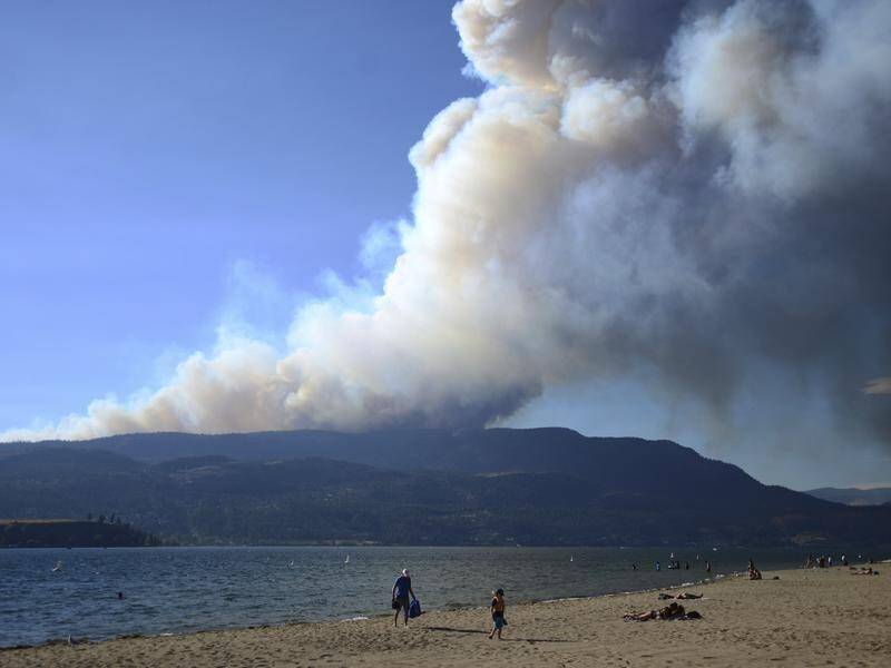 Storms, floods, a cold snap and record wildfires have battered eastern Canada in the past 12 months. (AP PHOTO)