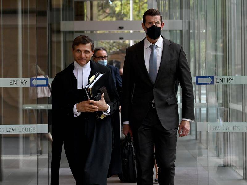 Barrister Arthur Moses (left) said the newspapers paid Afghan witnesses' costs for more than a year. (Bianca De Marchi/AAP PHOTOS)