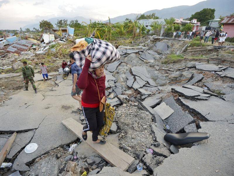 The Australian government has sent a plane load of aid to tsunami and quake ravaged Indonesia.