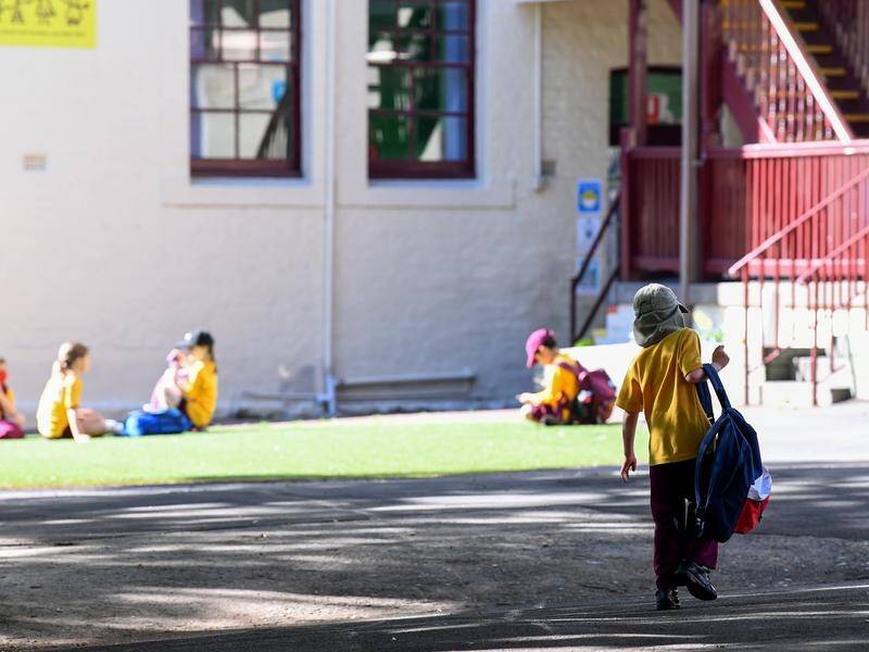The NSW government will give parents $500 vouchers to help with out-of-school care costs.