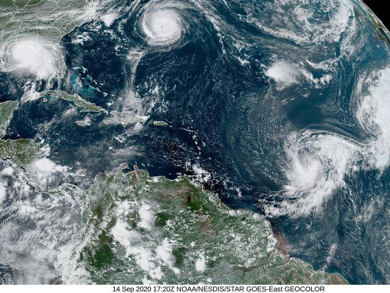 A satellite image shows five tropical cyclones churning in the Atlantic basin on September 14.