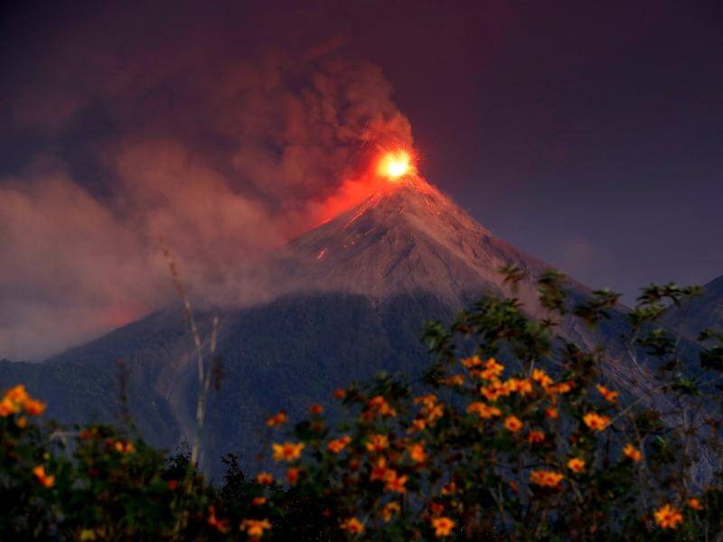 Guatemala's Fuego volcano has begun spewing hot ash, lava and gas, forcing thousands to flee.