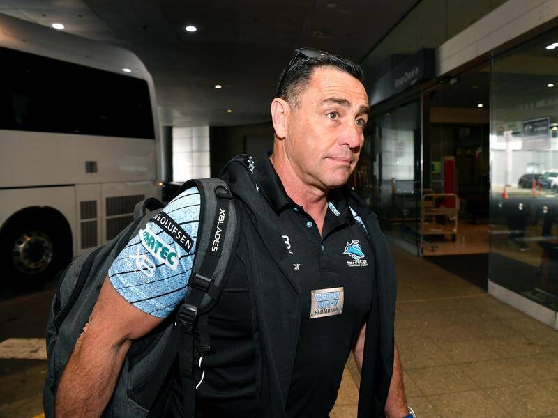 John Morris is acting like full-time Cronulla coach after Shane Flanagan's (pic) NRL deregistration.