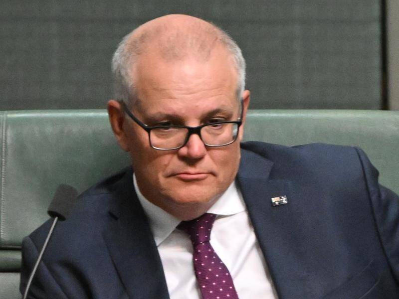 Scott Morrison welcomed the report and indicated he wouldn't resign from parliament. (Mick Tsikas/AAP PHOTOS)
