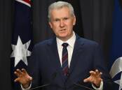 Workplace Relations Minister Tony Burke wants to end employers getting rid of enterprise agreements. (Lukas Coch/AAP PHOTOS)