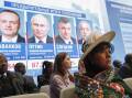 Early results show a landslide win for President Vladimir Putin and another six year term in office. (EPA PHOTO)