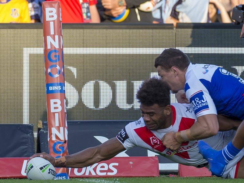 Mikaele Ravalawa scores a try out wide in the Dragons' big NRL win over the Bulldogs.
