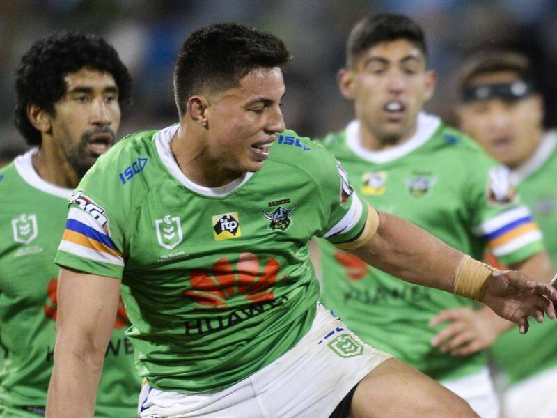 Canberra's Joe Tapine was fined for throwing a punch in their NRL win over Melbourne.