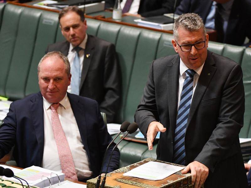 Nationals leader Barnaby Joyce (L) is sympathetic to Resources Minister Keith Pitt's demand.