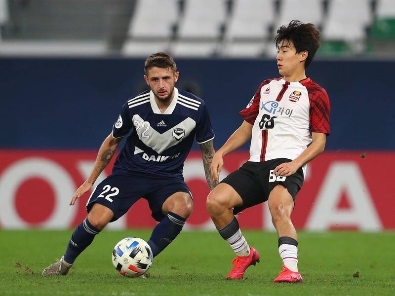 Jake Brimmer (left) scored a penalty to help Melbourne Victory into the last 16 of the ACL.