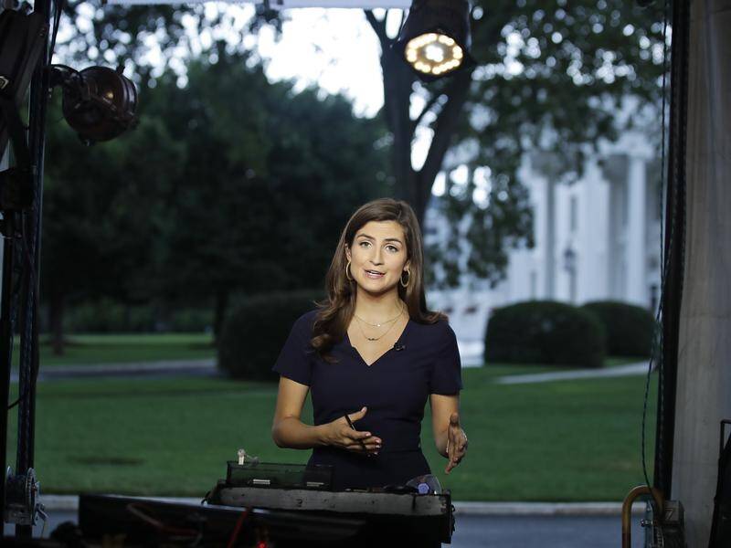 CNN's Kaitlan Collins 'was told repeatedly to leave the Oval Office', the White House says.