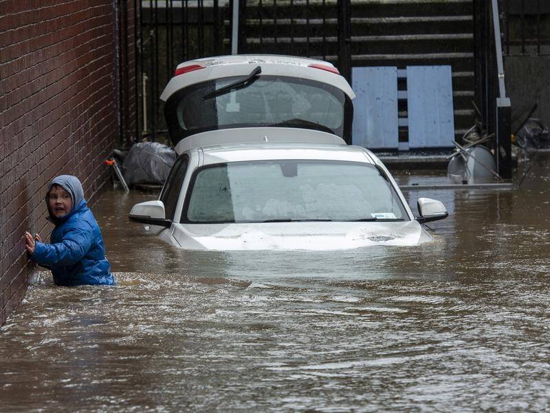 Rain from Dennis has caused rivers to break their banks and severe flooding in parts of the UK.