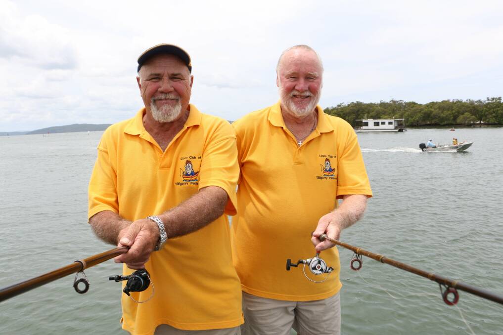 HOOKED: Tilligerry Lions Club members Mike Miles and Bob Royal at Lemon Tree Passage. Picture: Stephen Wark