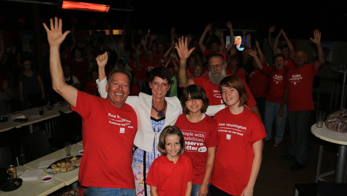 VICTORY: Labor candidate Kate Washington with friends and family at Lakeside Tavern on Saturday night, celebrating the win.