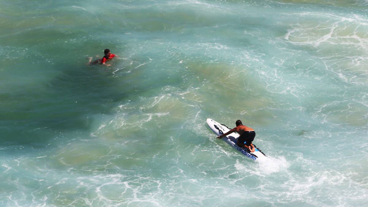 Redhead Beach lifeguards performed more than 70 rescues in two days, on January 12 and 13. Pictures: Peter Lorimer