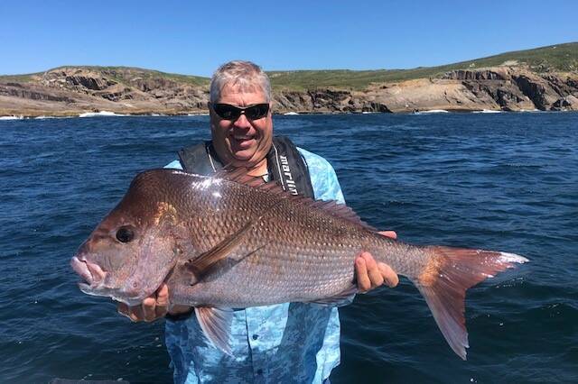 CATCH: Sydney champion Trevor Clenton, with this 6kg red caught wash fishing around Broughton Island.