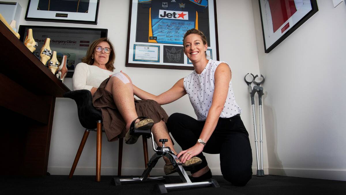 PEDAL POWER: Janice Dickinson(left) uses the stationary pedals a week after undergoing a total knee replacement, watched over by orthopaedic physiotherapist Larissa Sattler. Photo Cavan Flynn.
