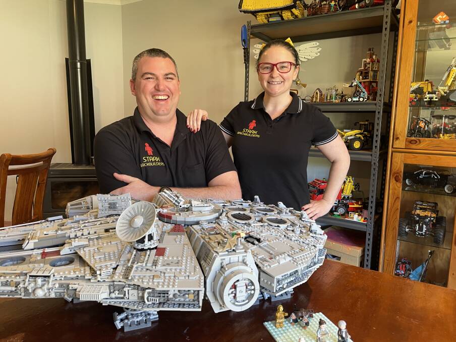 SENTIMENTAL: Neville Clark and Jacquie Stokes with their favourite and first build - the Millennium Falcon which took 36 hours. Photo: Alanna Tomazin